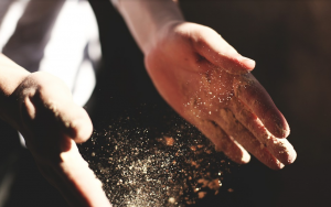Baker in Odessa covering hands in flower